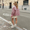Stylish printed cotton jacket with flattering silhouette and button closure