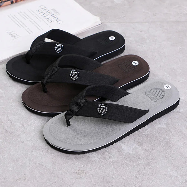 Men's flip flops featuring textured sole for wet surface grip