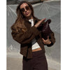 Street-smart brown polyester jacket featuring functional oversized pockets for urban wear