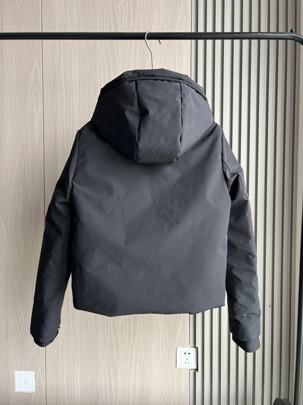 Women's waterproof windproof jacket with adjustable hood and regular fit