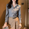 Chic striped blouse for office elegance, featuring a turn-down collar and single-breasted closure, perfect for professional w