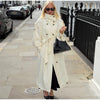 Neutral cream trench coat with adjustable belt for customizable fit