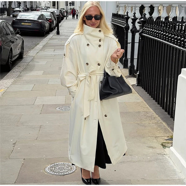 Neutral cream trench coat with adjustable belt for customizable fit