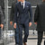 Elegant men's 3-piece suit featuring a double-breasted blazer, vest, and pants, perfect for weddings and business events.