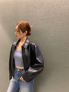 Chic cropped leather jacket for women in faux leather, perfect for autumn and winter, featuring a stylish turn-down collar.