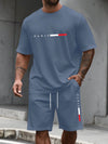 Contemporary men's tracksuit showing drawstring closure and pocket placement