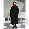 Sophisticated long-length trench coat with turtleneck collar and belt accent
