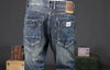 Men's jeans with practical pockets, blending style and utility.