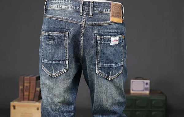 Men's jeans with practical pockets, blending style and utility.