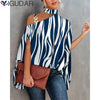 Elegant floral print blouse with batwing sleeves and halter collar, perfect for casual and office wear. Soft cotton blend.