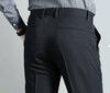 Elegant slim fit black men's suit trousers with button fly, perfect for business and formal occasions.