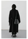 Luxurious wool blend coat with adjustable belt and protective turtleneck