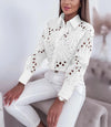 Chic women's hollowed-out long sleeve blouse in lightweight polyester, perfect for office wear or casual outings.