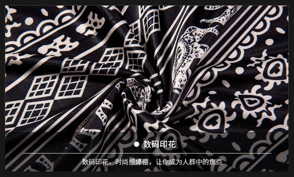 Bohemian flare leg pants for women in vibrant floral print, perfect for casual or festival wear in spring and summer.