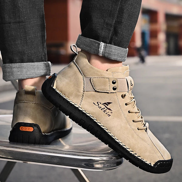 Lace-up leather boots with massage cushioning system