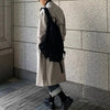 Men's long double-breasted trench coat with turn-down collar, perfect for autumn and winter streetwear and casual style.