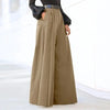 Chic wide leg palazzo pants for women in nylon-cotton blend, featuring pockets and button detail for stylish comfort.