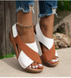 Women's platform sandals featuring cushioned footbed and stable wedge heel