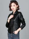 Chic women's sheepskin leather jacket with zippered front, turn-down collar, and pockets for stylish autumn layering.