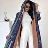Wanderlust blue trench coat with hood providing full coverage from shoulders to ankles