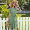 Classic polka dot print on flowing pleated midi dress