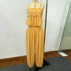 Side view of wide-leg trousers with lace top ensemble