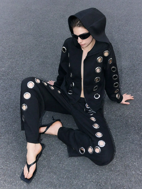 Y2K hollow drawstring pants in loose fit with decorative zippers and adjustable waist for unisex streetwear style