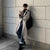 Men's long double-breasted trench coat with turn-down collar, perfect for autumn and winter streetwear and casual events.