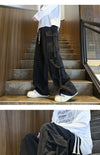 Men's vintage jeans in a stylish wide-leg cut and coated finish.