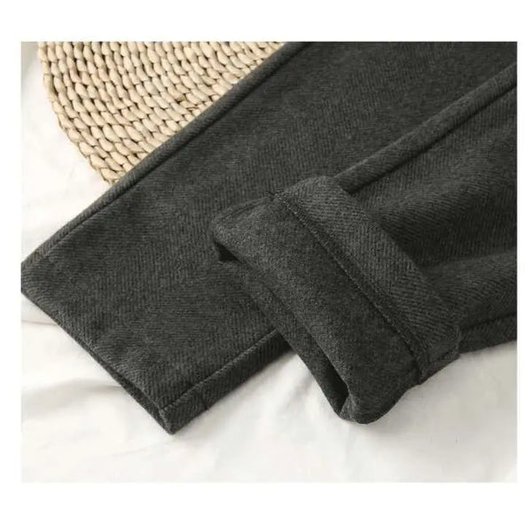 Modern high-waisted work pants featuring button details and regular fit for sophisticated office style