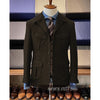 Vintage tweed herringbone men's blazer with four pockets, notched collar, and single-breasted design for stylish occasions.