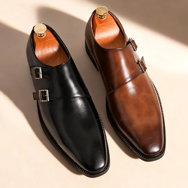 Brown monk strap leather oxfords with double buckle closure on white background