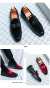 Men's leather loafers worn with business suit for boardroom presentation