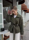 Women's belted trench coat with structured double-breasted design