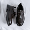 Sophisticated style in classic men's patent leather Oxfords.