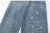 Trendy washed and ripped wide-leg women's jeans with distressed ink-splashed finish for a chic casual look.