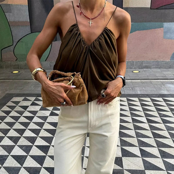 Elegant backless satin top with V-neckline and pleated front design
