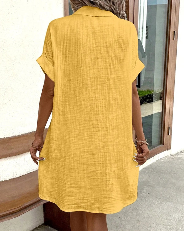 Back view of breathable summer dress showing relaxed fit and knee-length hem