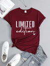Black round neck tee with statement letter graphics for casual wear