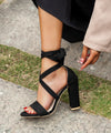 Stylish cream stiletto sandals with a zip-up back and true to size fit.