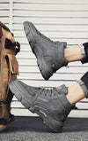 Winter Vanguard boots paired with outdoor gear for adventure-ready style.