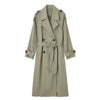 Timeless x-long trench coat showing sophisticated drape and elegant construction