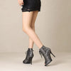 Women's high heel ankle boots with dramatic snake-print finish