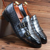 Close-up of double monk strap detail on men's dress loafers.