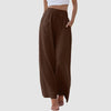Pleated front wide-leg pants with adjustable straps and practical pockets for everyday comfort