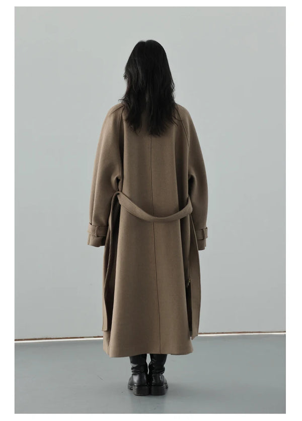 Investment piece wool trench with adjustable belt and extended length coverage