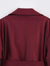 Spring belted trench coat in regular length with timeless design