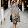 Versatile button-front floral dress with structured lapel and flowing design