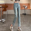 Chic high waist straight leg jeans for women in distressed wash, perfect for casual outings and office wear.