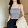 Regular length white camisole with adjustable straps and padding
